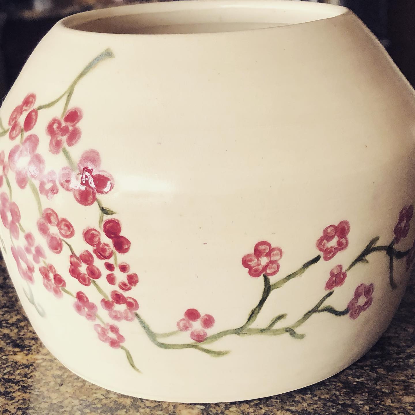 Cherry blossom branch pottery vase