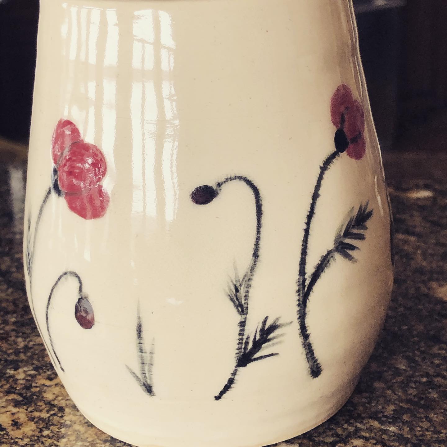 Rose-topped lidded vessel